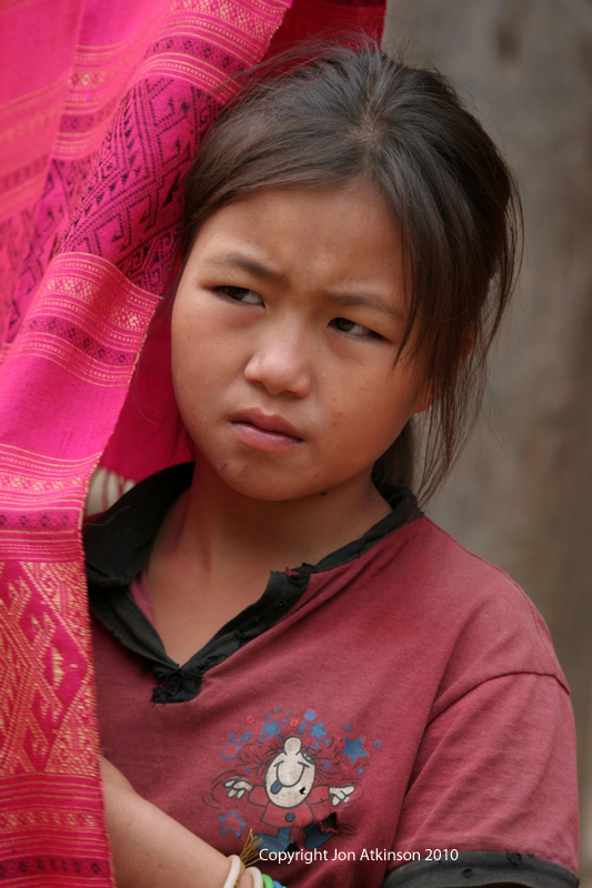 Selling Silk, Mekong River Village, Laos Selling Silk, Mekong River Village, Laos